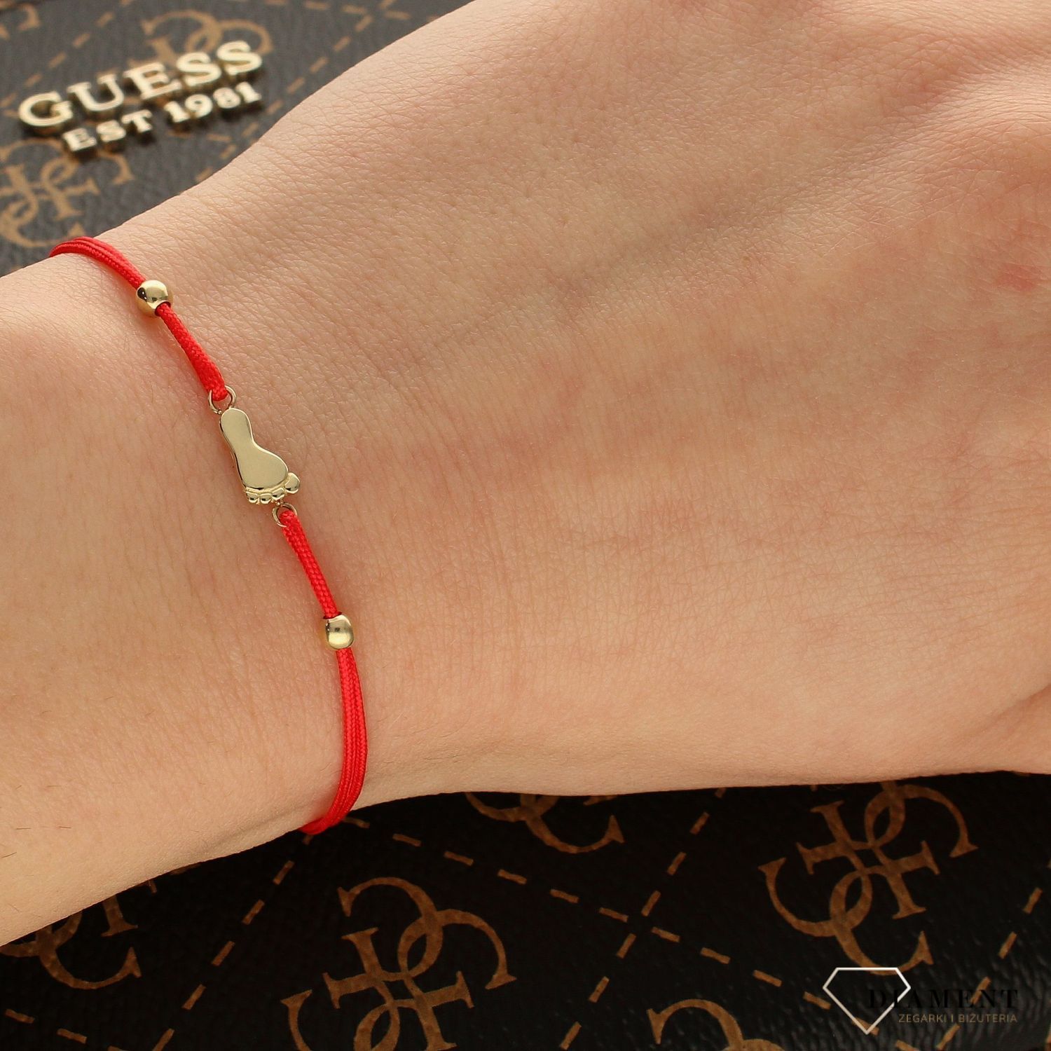 Złota bransoletka na sznureczku 'Dziecięce stópki' 585 BR 6611 (1).jpg